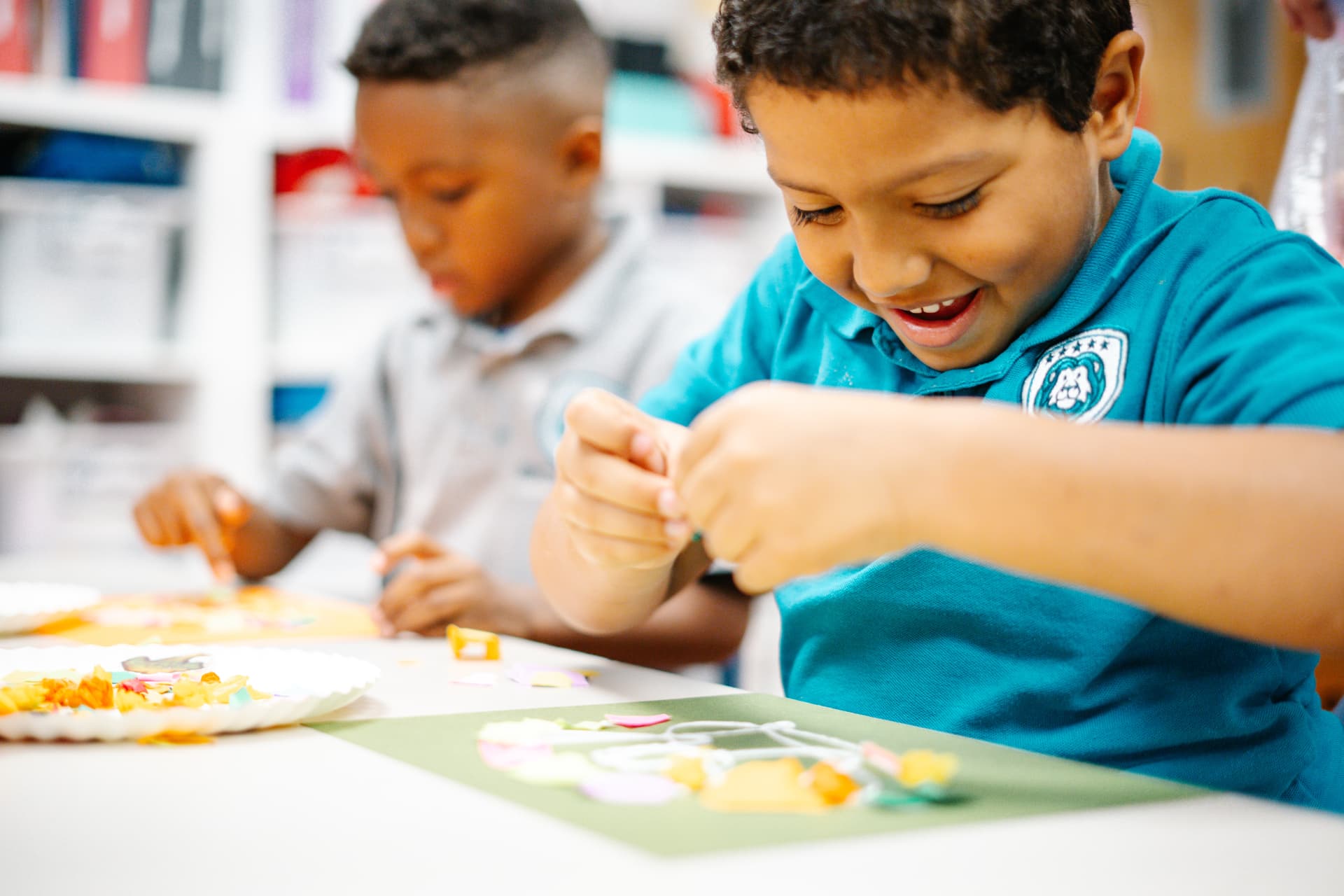 Broward Christian Academy students working on a hands-on classroom art project