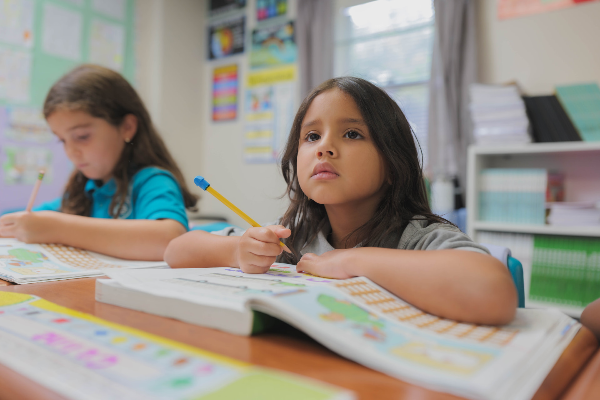 Elementary students participating in Bible study and character development